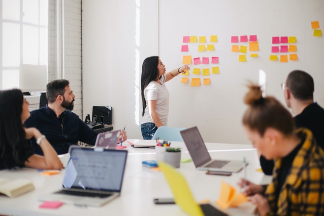 Group working with post-it notes - small