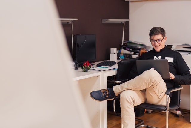 Happy man with laptop