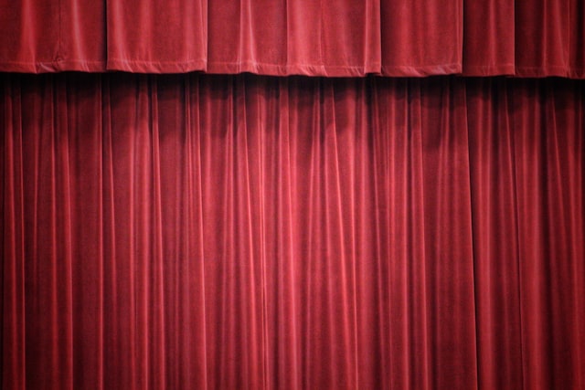 Closed theatre curtains before the start of a show